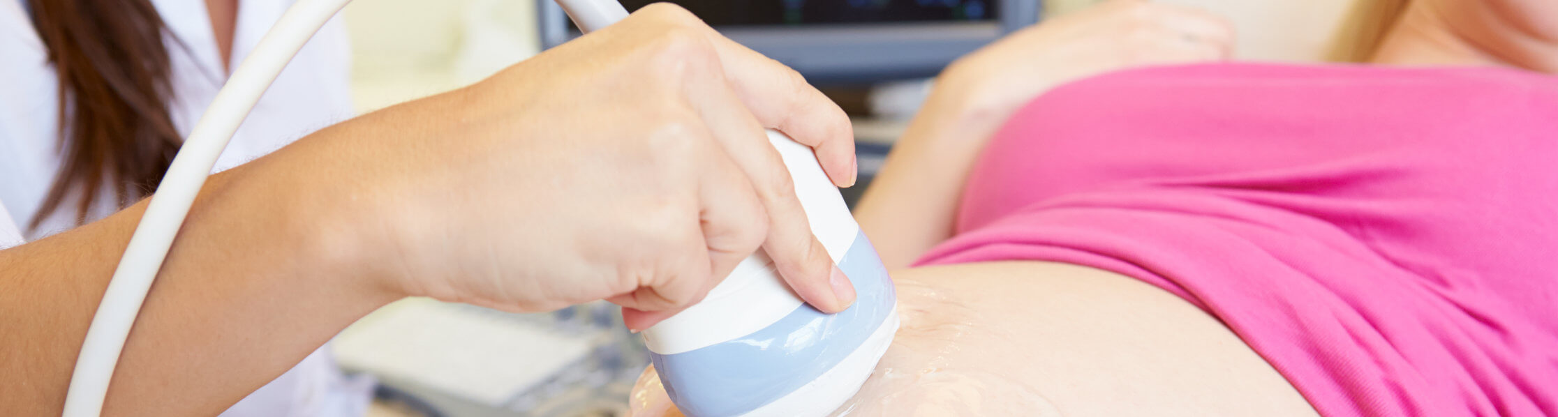 a woman's belly receiving ultrasound